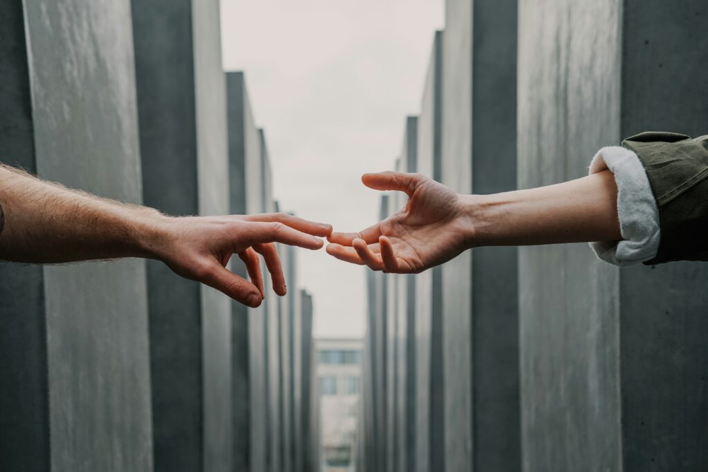 Picture of people touching hands